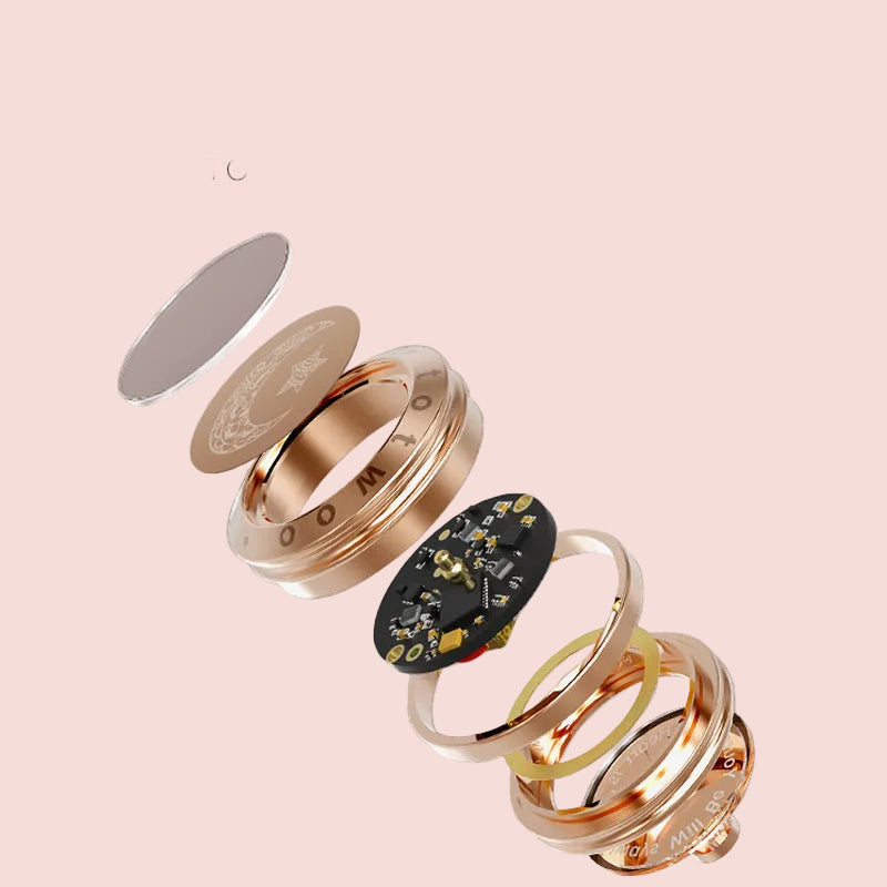 Smart ring with Bluetooth connection app on a beige background